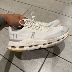 On Running White and Gray Sneakers